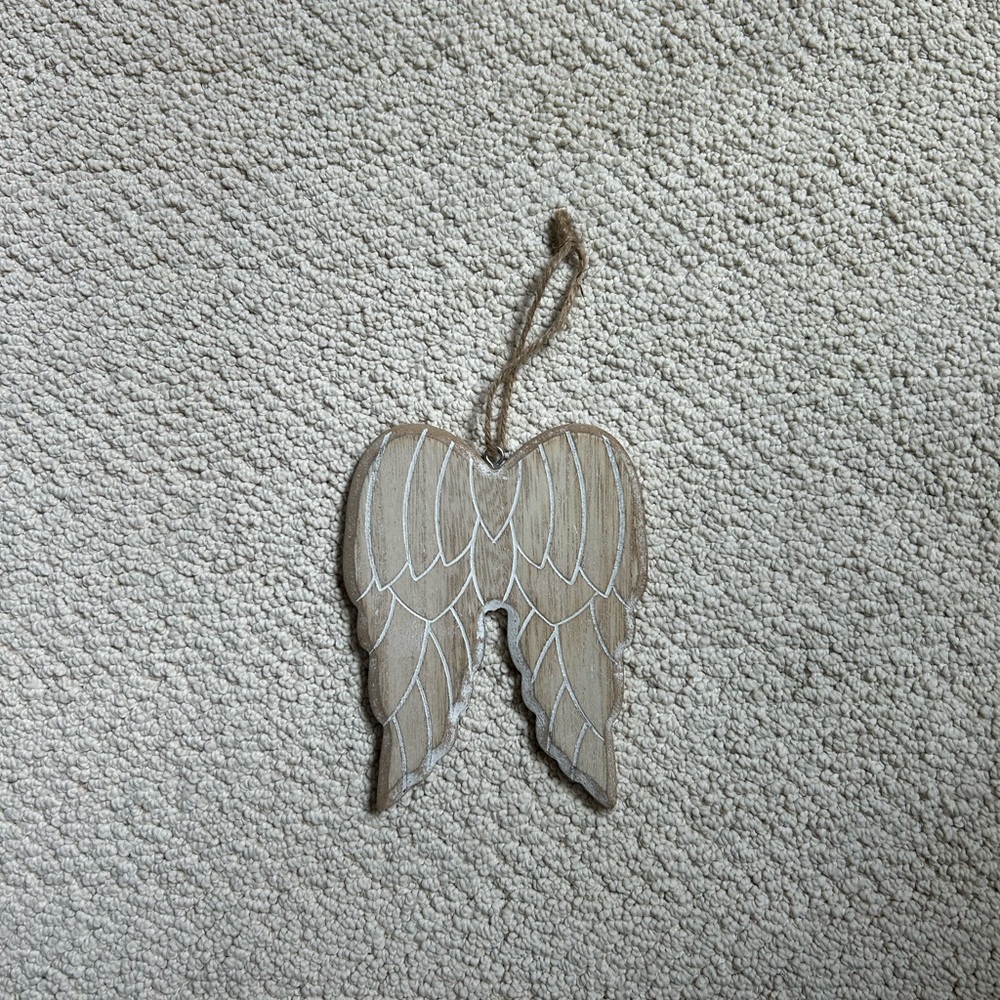 white wooden angel wing wall hanging